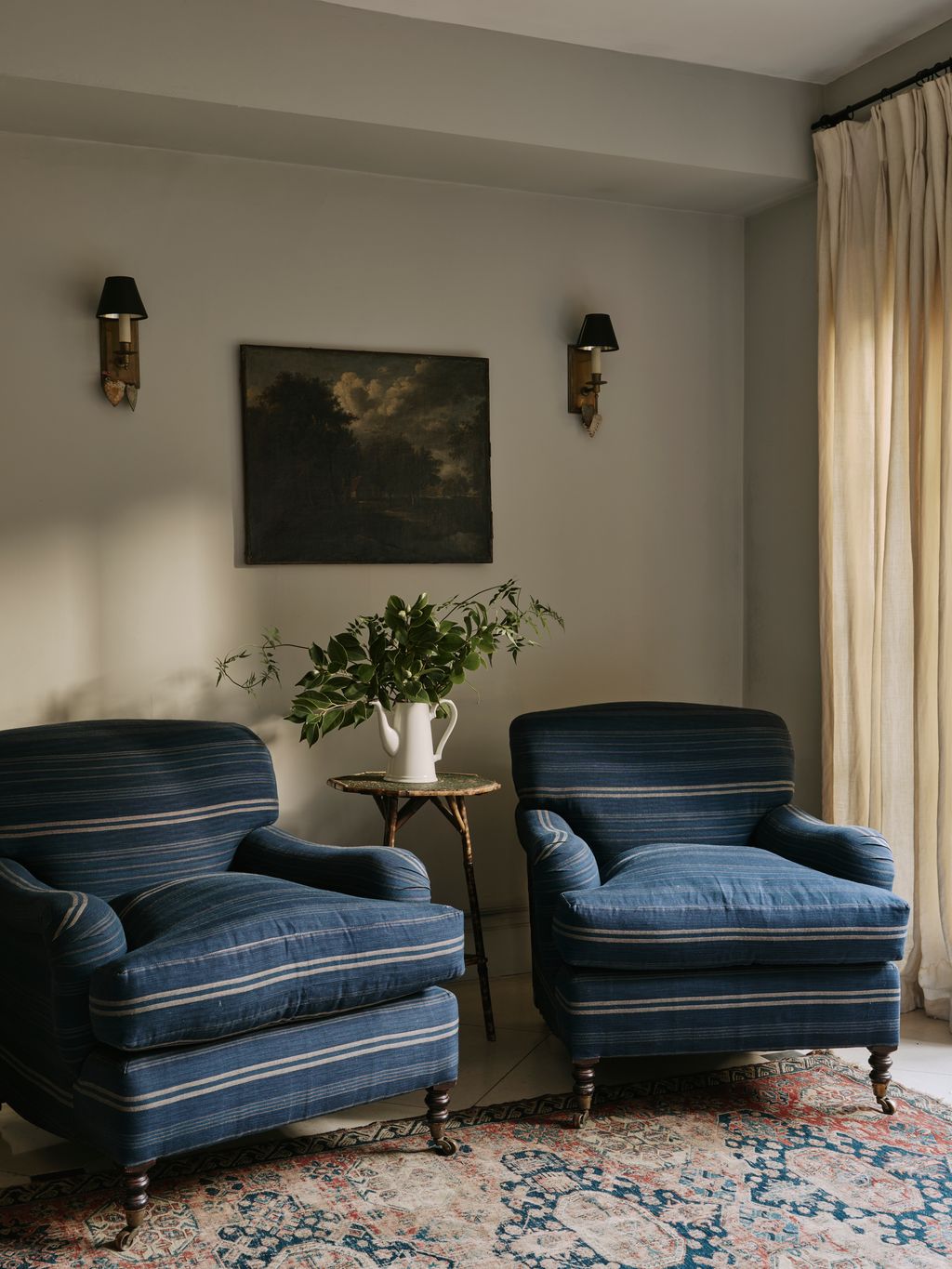 Image may contain Furniture Chair Armchair and Plant