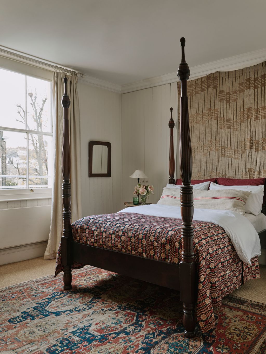 Image may contain Furniture Indoors Bed Bedroom Room and Canopy Bed