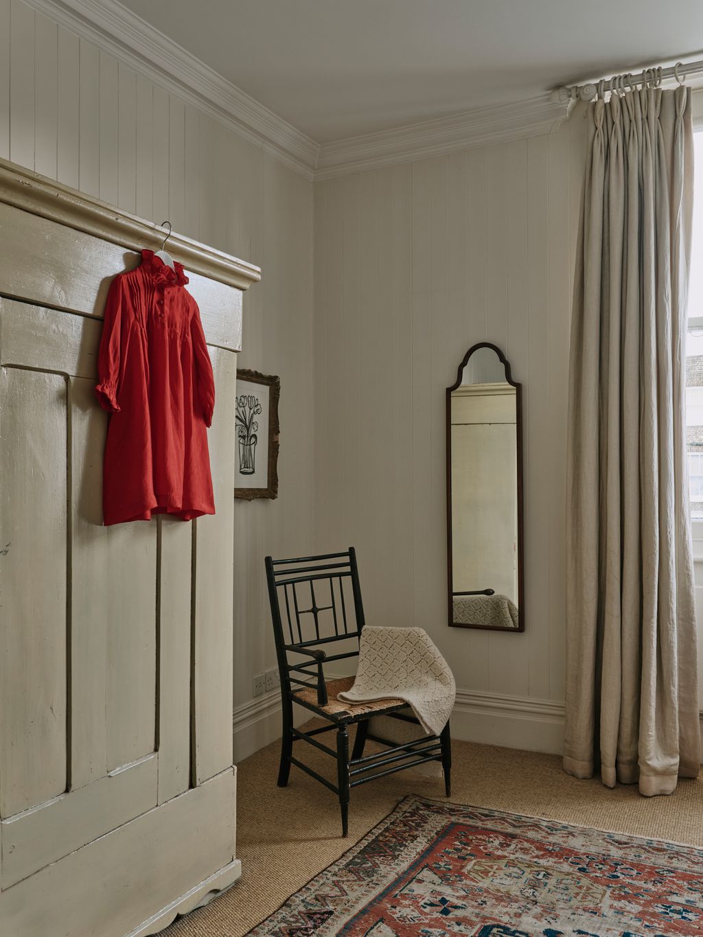 Image may contain Dressing Room Indoors Room Interior Design Chair Furniture Home Decor Clothing and Coat