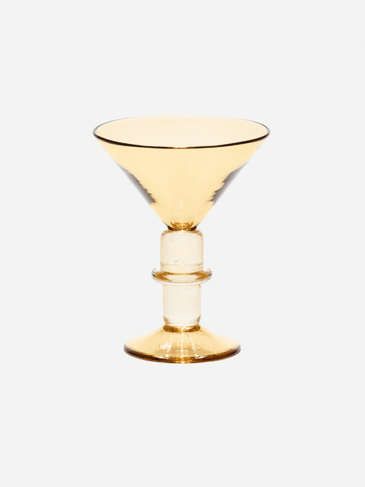Image may contain Glass Goblet Smoke Pipe Alcohol Beverage and Cocktail