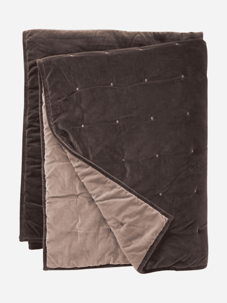 Image may contain: Blanket, Cushion, Home Decor, Clothing, Coat, Jacket, and Quilt